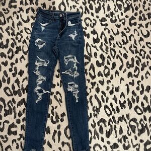 Distressed Blue Denim Jeans